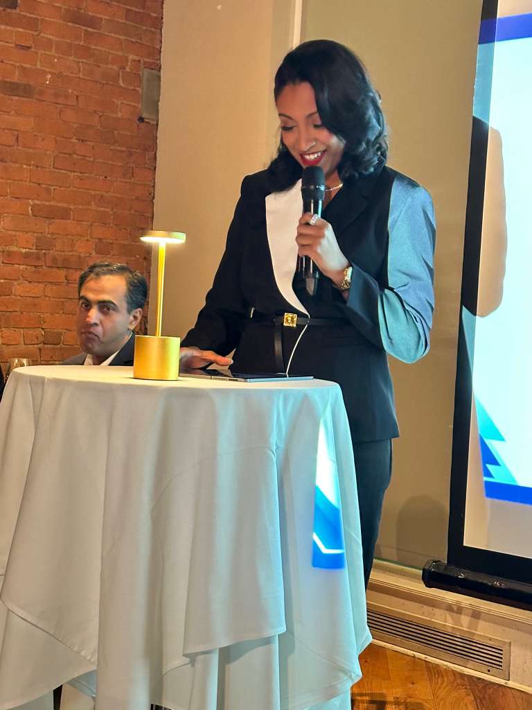 Andrea Beltre speaking at a healthcare industry event